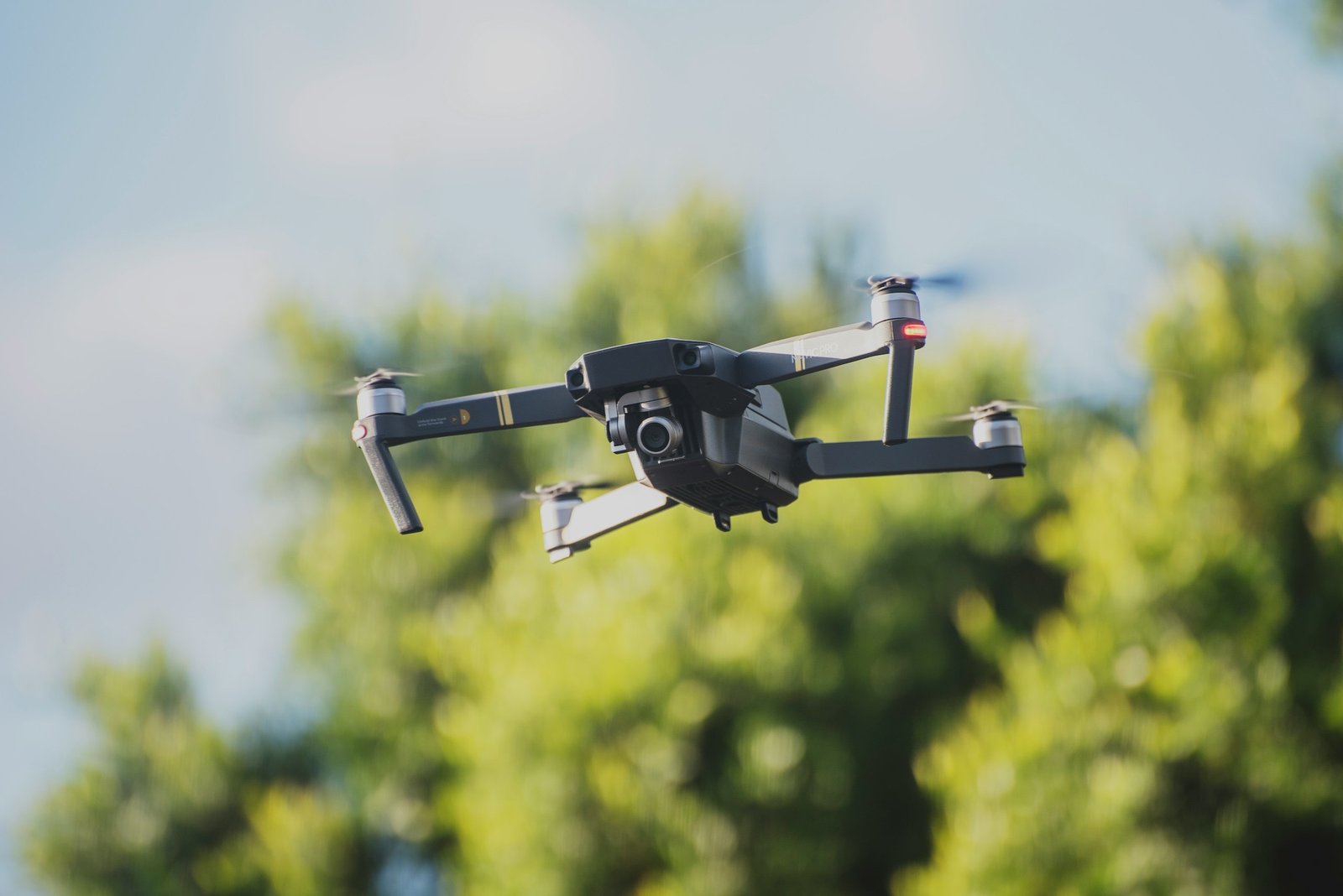 Camera drone hovering in flight