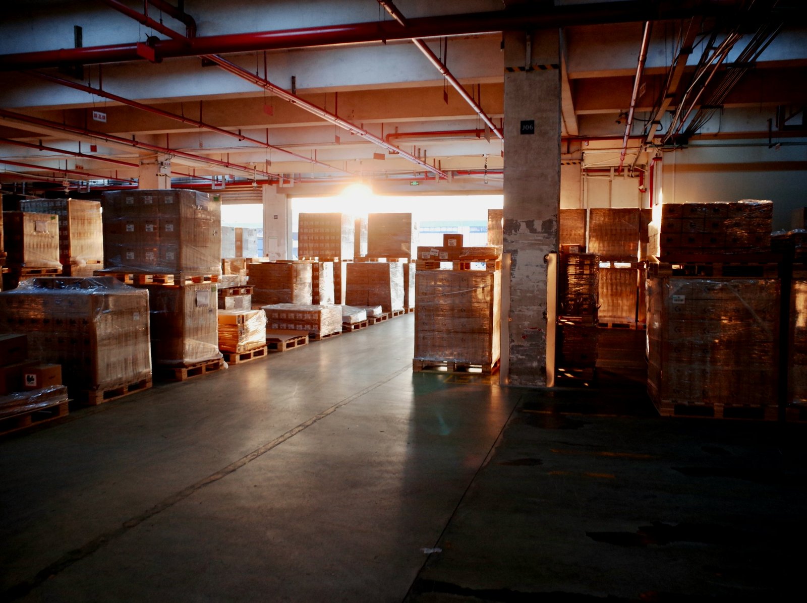 Pallets of goods staged in a distribution warehouse